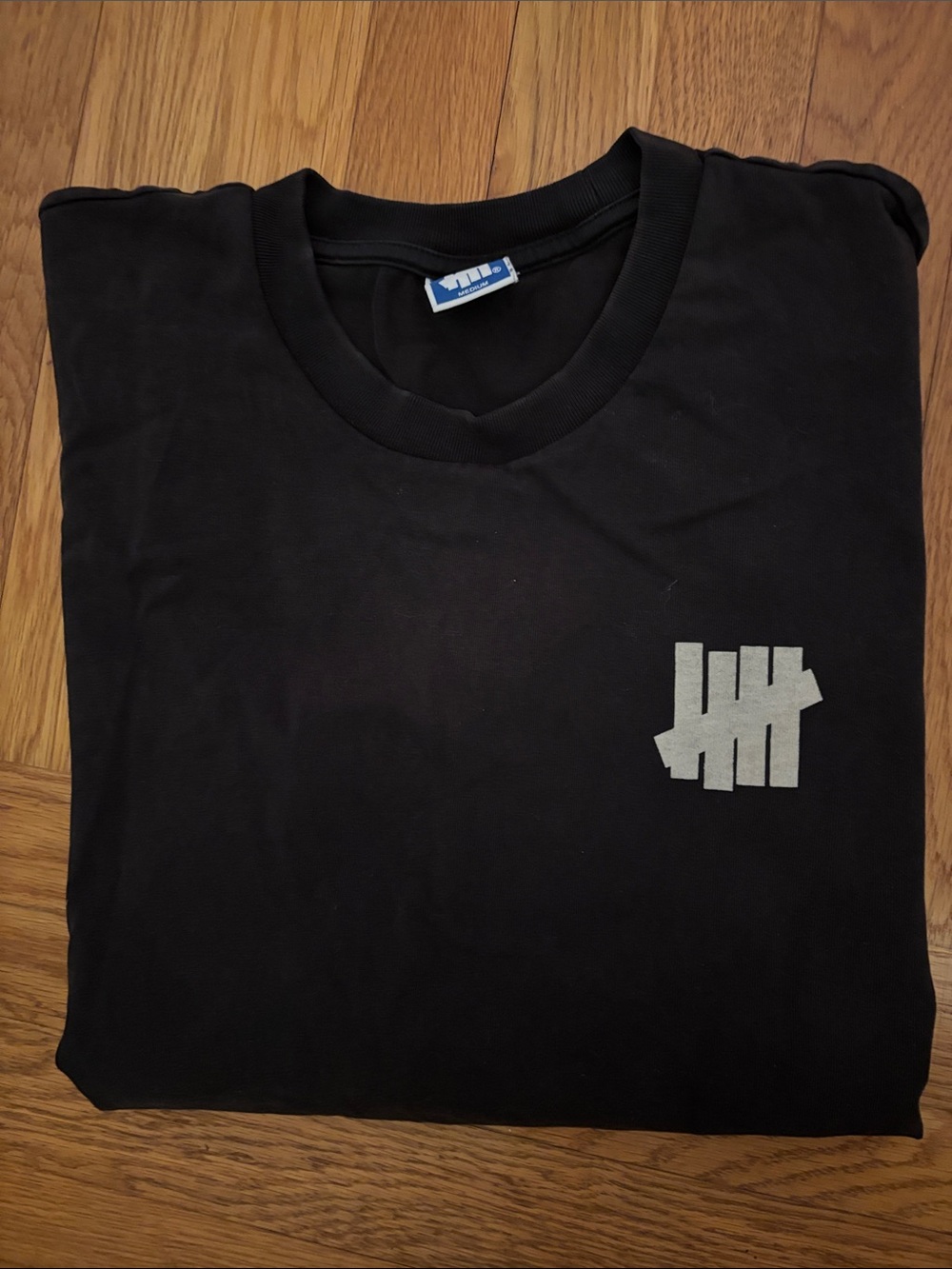 Undefeated Black Short-Sleeve Tee with Gray Tally Logo